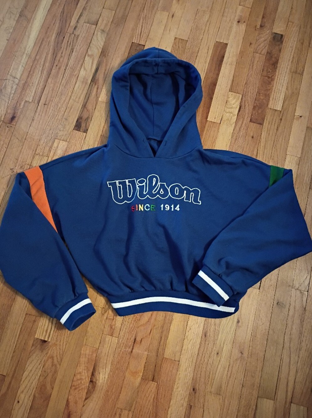 Wilson Navy Hoodie with Orange and Green Accents